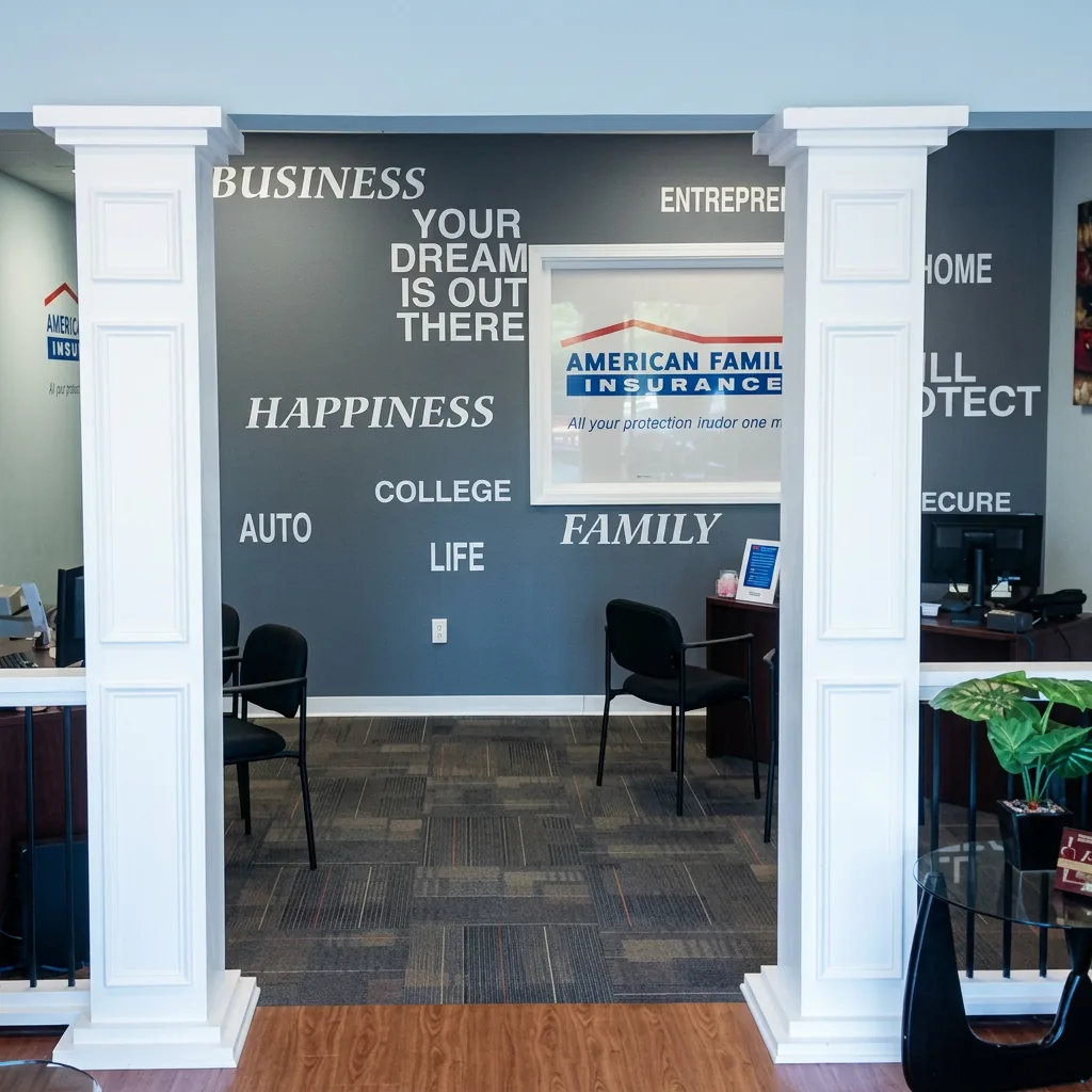 American Family Insurance commercial office reception area with architectural detailing, wall graphics, and client facing branded workplace design