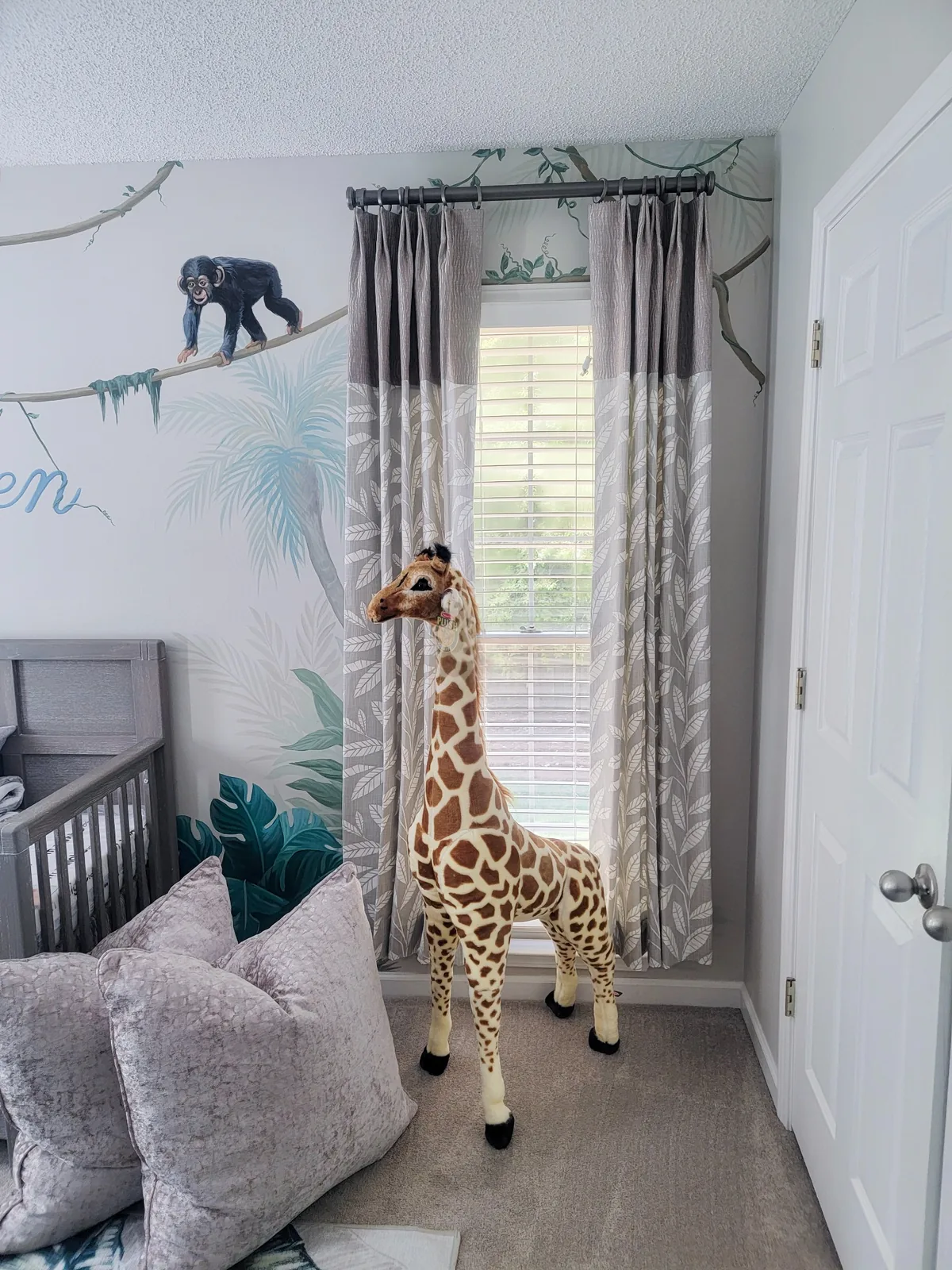 Nursery drapery detail with decorative hardware, custom fabrication, layered fabrics, and tailored finishes
