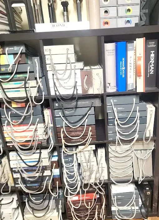 Common Craft Studio design library with fabric books, trim samples, and drapery hardware collections
