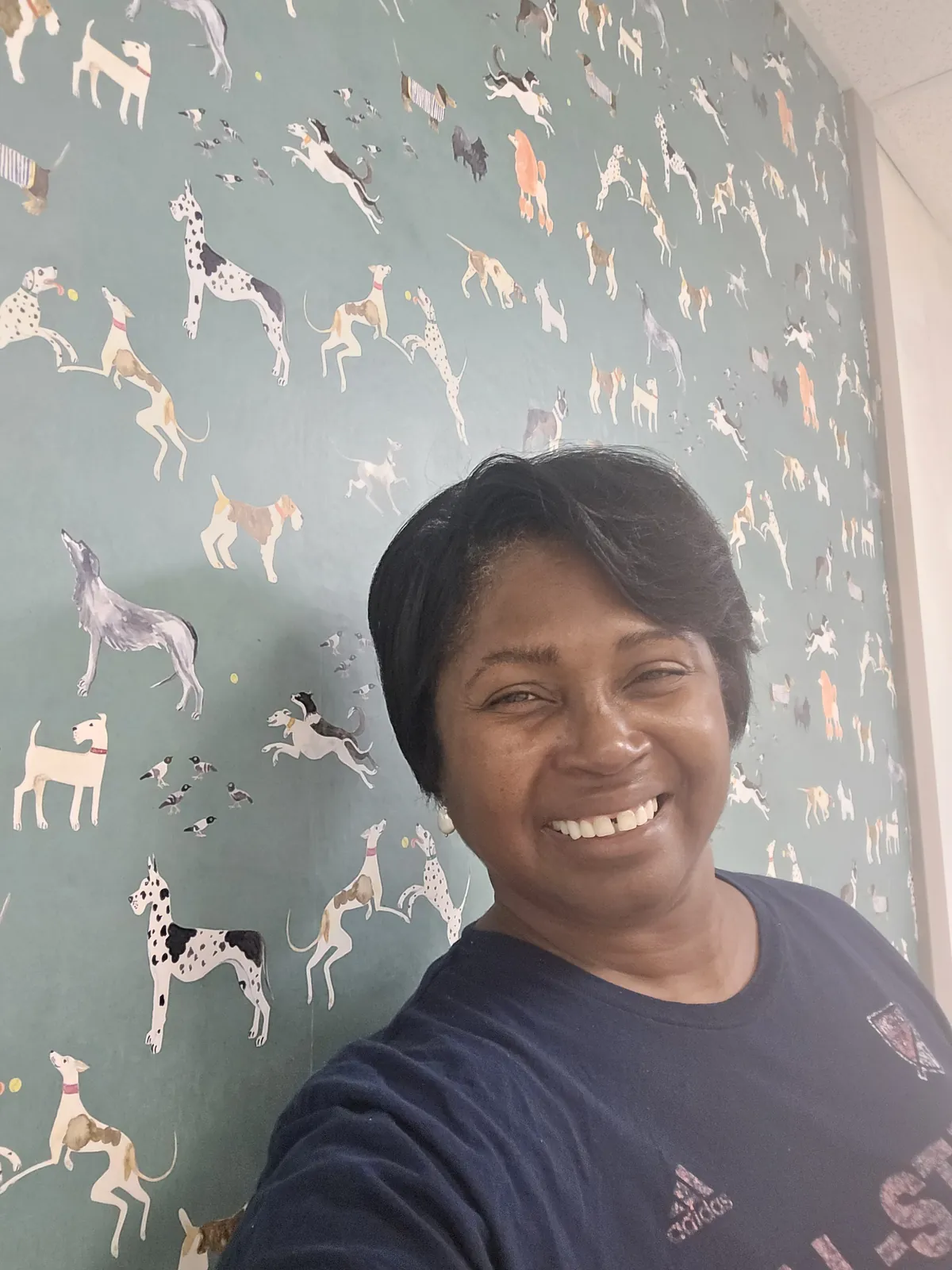 Debora Barber on site during a commercial wallpaper installation for Common Craft Studio