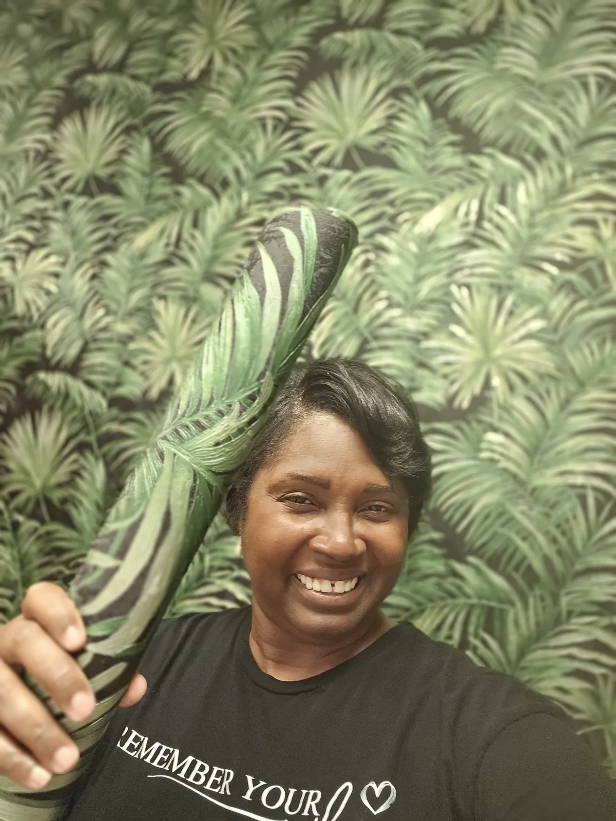 Debora Barber of Common Craft Studio on site during a wallpaper installation in Atlanta